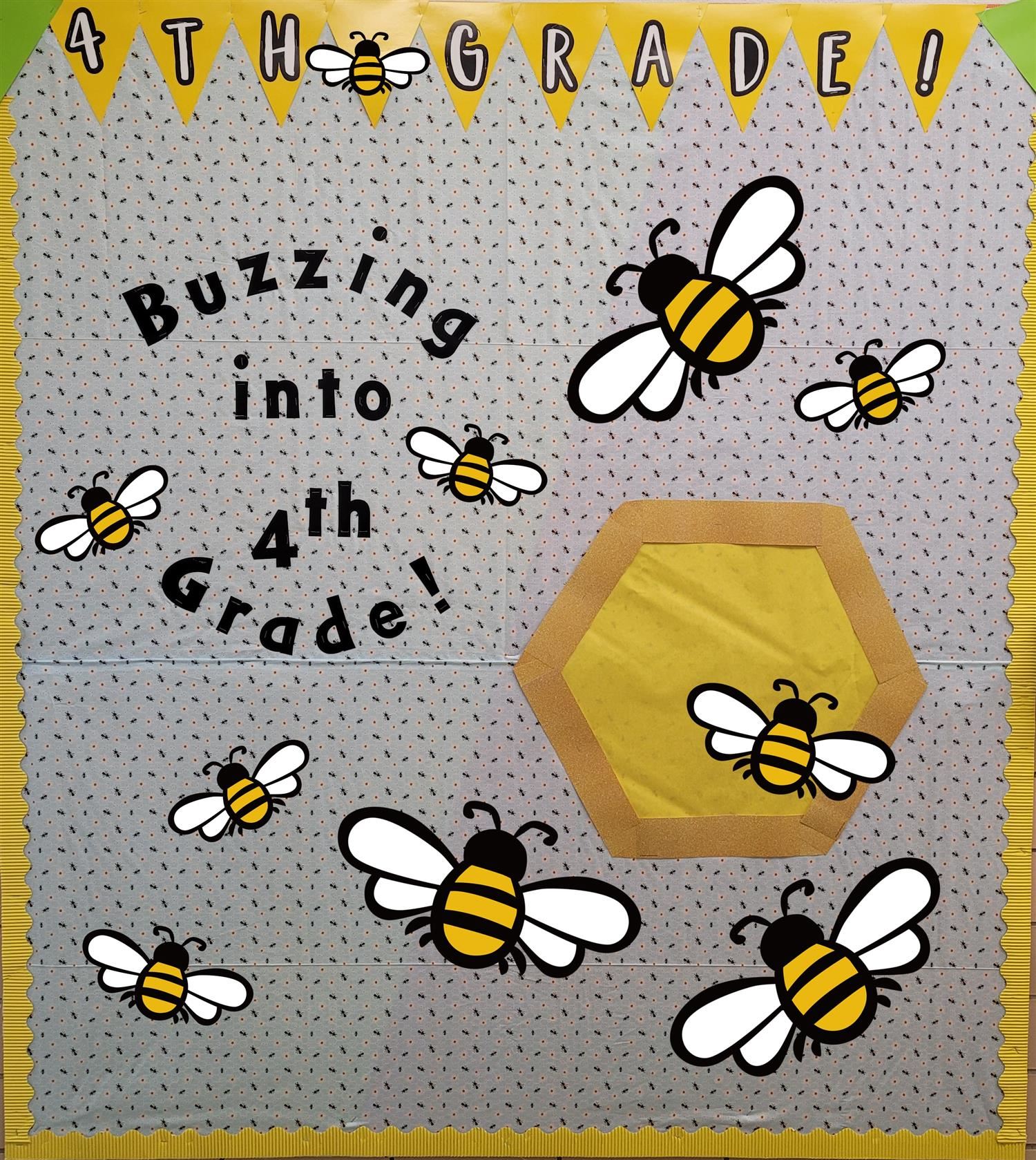 Our Bulletin Board (It Says: Buzzing into 4th Grade! And has bees on it all)